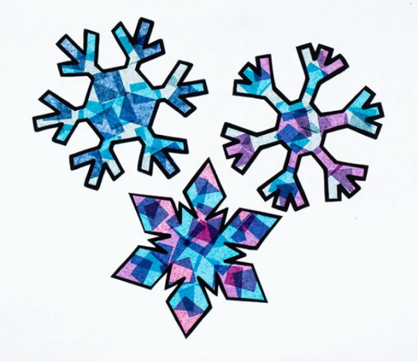 snowflake shapes with multicolored tissue paper creating a stained glass effect