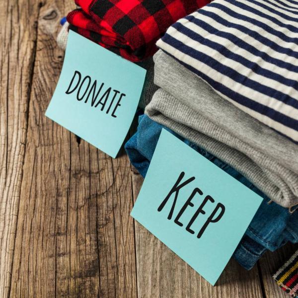 donate or keep piles of clothes 
